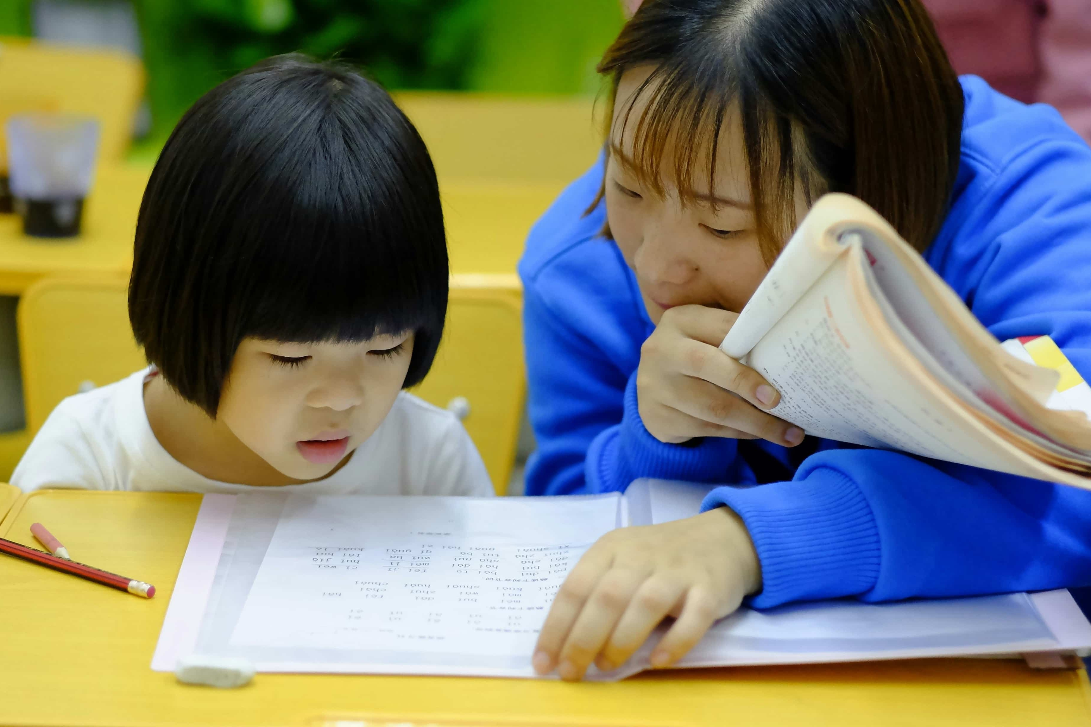 Primary school students learning in a classroom